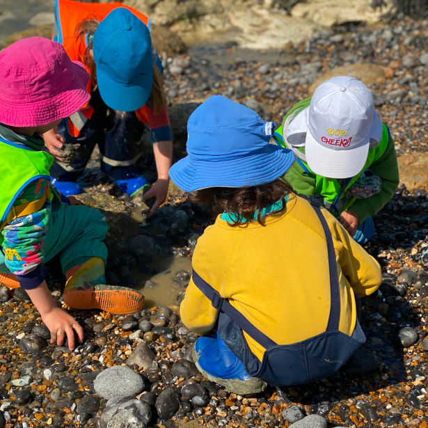 Kids playing by the sea